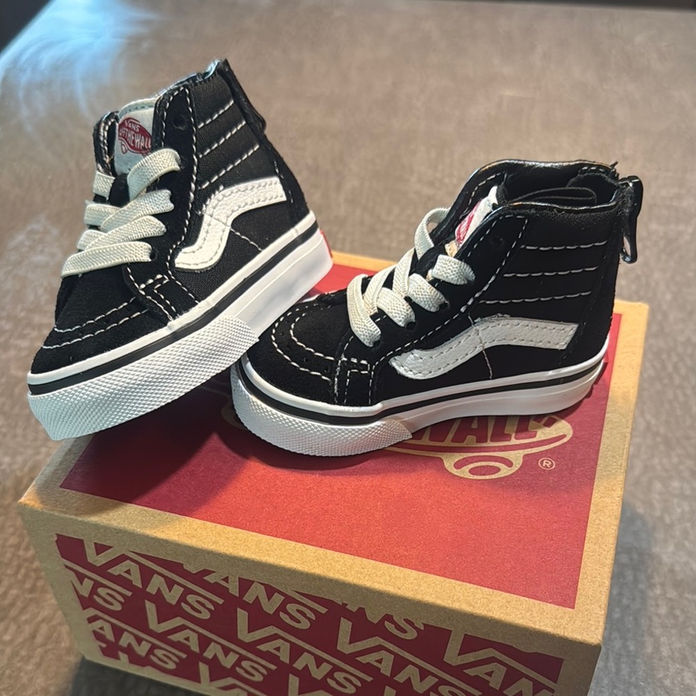 Vans Black and White High-Top Sneakers